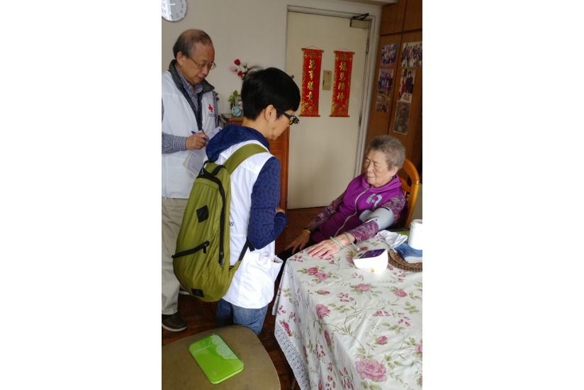 Trained volunteers conduct home visits to measure blood pressure for the elderly.